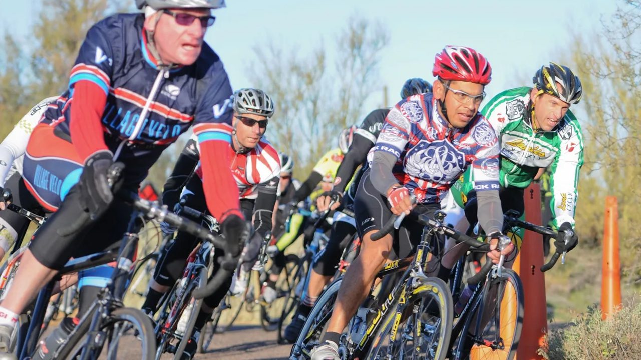 Cyclists racing on a road.