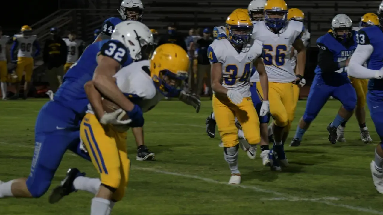 Football game, players in action.